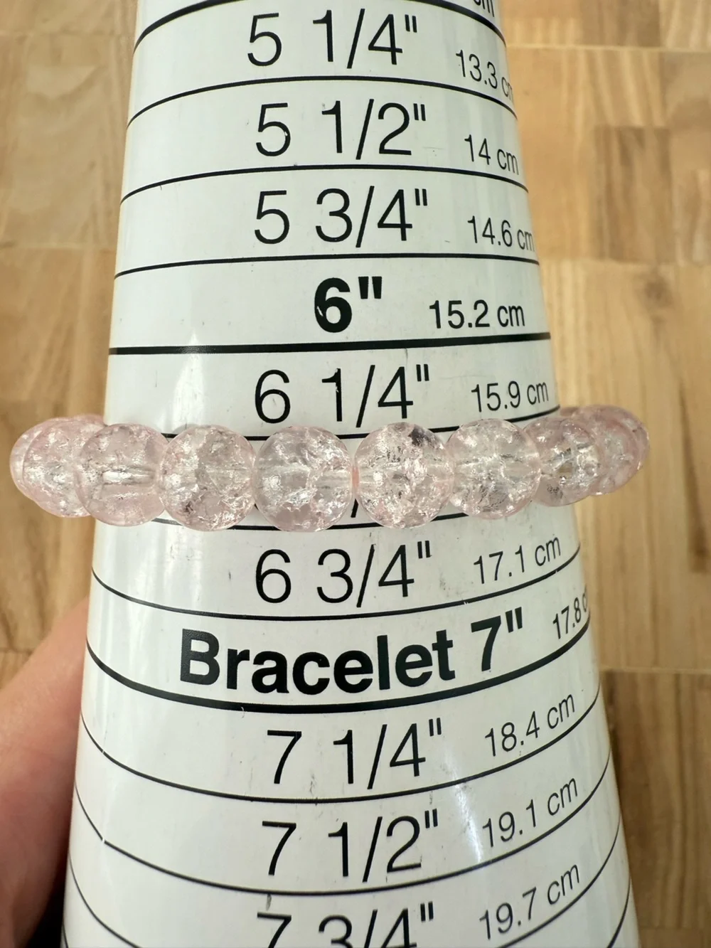 Baby Stitch from LILO & Stitch light pink crackle-glass bead stretch bracelet